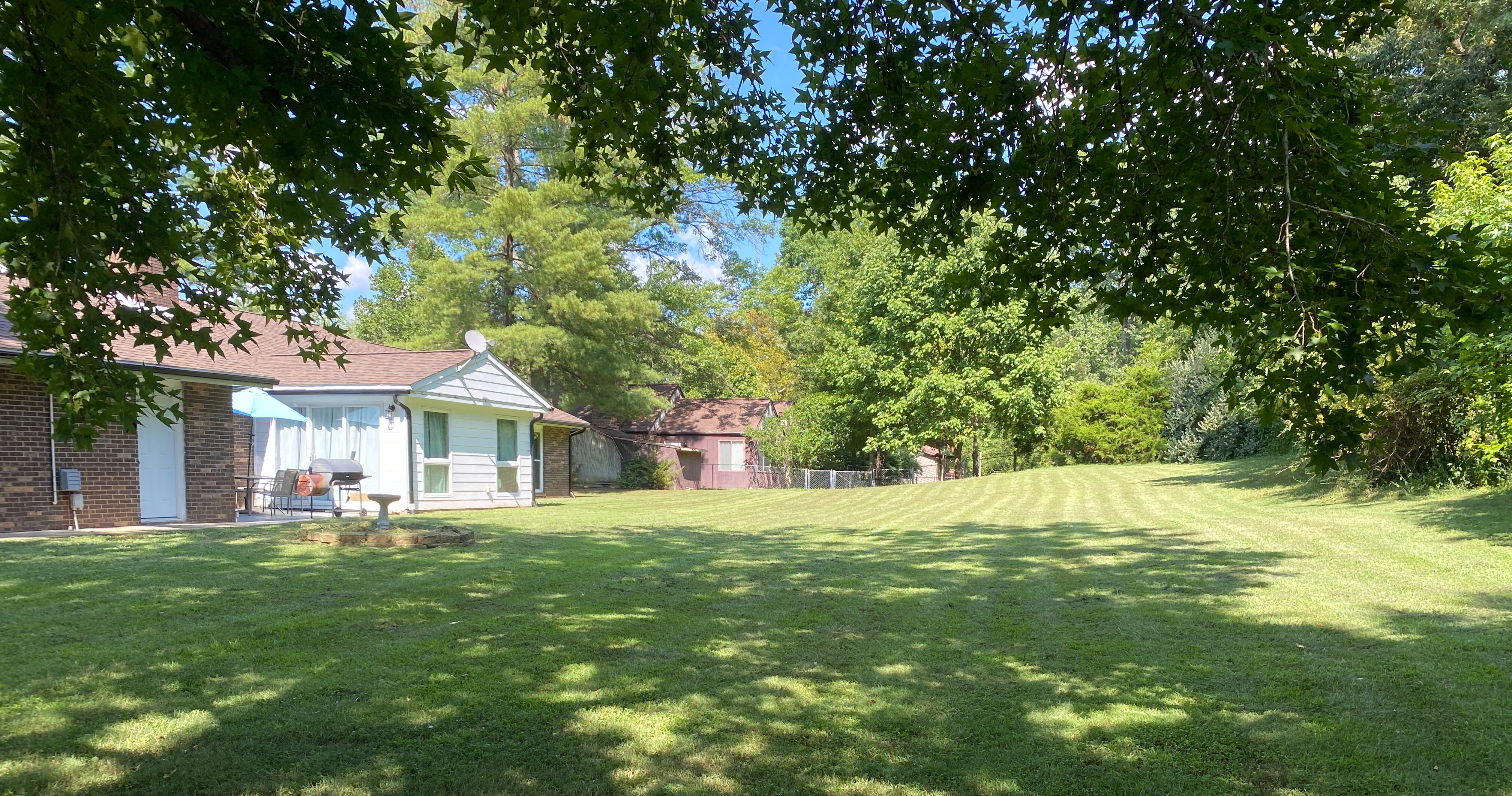 Freshly mowed and maintained yard — completed job