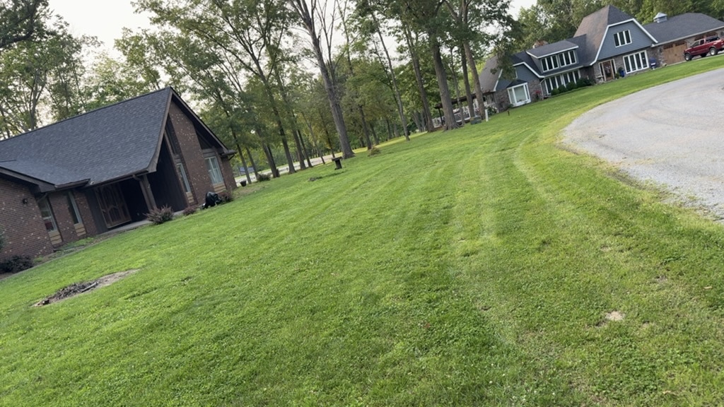 Well-maintained yard with clean edges — completed lawn service